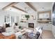 Sunlit living room with a fireplace, custom built-ins, and stylish furniture at 1119 Simmons St, Mount Pleasant, SC 29464