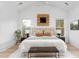 Bright main bedroom with neutral decor, a decorative headboard and ceiling fan at 1119 Simmons St, Mount Pleasant, SC 29464