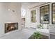 Inviting patio with a cozy fireplace, comfortable seating, and an outdoor living space at 1119 Simmons St, Mount Pleasant, SC 29464