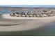 Expansive beachfront community offering a tranquil oasis with a sandy beach and waterway at 112 Ocean Blvd, Isle of Palms, SC 29451