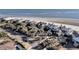 Coastal community homes with lush landscapes offer serene living near the beach at 112 Ocean Blvd, Isle of Palms, SC 29451