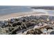 Beachfront homes with a picturesque sandy coastline offering serene coastal living at 112 Ocean Blvd, Isle of Palms, SC 29451