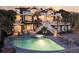 A backyard showcasing a luxurious pool, hot tub, and spacious patio for outdoor entertaining at 112 Ocean Blvd, Isle of Palms, SC 29451