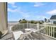 Relax on this beach side balcony and take in the beautiful beach and palm tree views at 112 Ocean Blvd, Isle of Palms, SC 29451