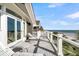 Balcony with beach view has outdoor seating and a white railing surrounding the perimeter at 112 Ocean Blvd, Isle of Palms, SC 29451