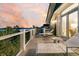 Expansive balcony offers stunning water views and lounge seating, perfect for relaxing outdoors at 112 Ocean Blvd, Isle of Palms, SC 29451