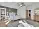 This bedroom boasts a gorgeous ceiling fan, wood floors, and great natural light at 112 Ocean Blvd, Isle of Palms, SC 29451