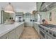 Spacious kitchen with stainless steel appliances, custom cabinetry, and a large center island at 112 Ocean Blvd, Isle of Palms, SC 29451