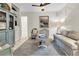 Comfortable living room with stylish decor, unique light fixture, and an open doorway at 112 Ocean Blvd, Isle of Palms, SC 29451