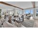 Spacious living room with ample seating, ocean views, and a neutral color palette at 112 Ocean Blvd, Isle of Palms, SC 29451