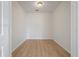 A bedroom featuring wood floors, white walls, and natural light at 130 River Landing Dr # 5108, Charleston, SC 29492