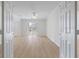 Bright living room with neutral paint, light wood floors, and sliding glass doors at 130 River Landing Dr # 5108, Charleston, SC 29492
