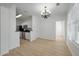 Open-concept living space with kitchen and dining area, featuring abundant natural light at 130 River Landing Dr # 5108, Charleston, SC 29492
