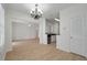 Bright living space with chandelier, open floorplan, and stainless-steel kitchen appliances at 130 River Landing Dr # 5108, Charleston, SC 29492