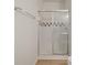 Bathroom shower stall with sliding glass doors and brown and white checkered tile accent at 130 River Landing Dr # 5108, Charleston, SC 29492