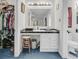 Classic-style bathroom features black and white tiling, vanity and sink, along with storage at 135 Rapture Ln, Wando, SC 29492
