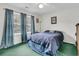 Bedroom with large window, neutral walls, and a cozy feel with nice carpet at 135 Rapture Ln, Wando, SC 29492