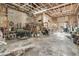 Spacious garage with concrete floor, ample storage space, and backyard access at 135 Rapture Ln, Wando, SC 29492