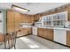 Bright kitchen with ample cabinet space, white appliances, and a breakfast nook at 135 Rapture Ln, Wando, SC 29492