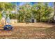 Fenced backyard with patio furniture, grill, and a shed at 137 Dowling Ave, Walterboro, SC 29488