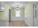 Eat-in dining room featuring unique lighting and plenty of space for Gathering meals at 137 Dowling Ave, Walterboro, SC 29488