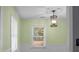 Dining area featuring unique lighting and a great view of the outdoors through the window at 137 Dowling Ave, Walterboro, SC 29488