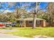 Charming brick home with a screened porch and ample yard space at 137 Dowling Ave, Walterboro, SC 29488