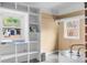 Mud room features shelving, a window, and a hot water heater at 137 Dowling Ave, Walterboro, SC 29488