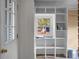 Mud room features shelving, a window, and a door to the outside at 137 Dowling Ave, Walterboro, SC 29488