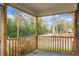 Cozy screened porch perfect for relaxing and enjoying the neighborhood views at 137 Dowling Ave, Walterboro, SC 29488