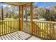 Inviting screened porch offering a view of the street and surrounding greenery at 137 Dowling Ave, Walterboro, SC 29488