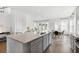 Kitchen island with granite countertops, seating, and stainless steel appliances with a view of the dining area at 1439 Clay Field Trl, Summerville, SC 29485