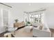 Bright and airy living room filled with natural light and features stylish contemporary furnishings at 1439 Clay Field Trl, Summerville, SC 29485
