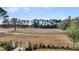 The backyard overlooks a manicured golf course. Trees define the perimeter of the course at 151 Brailsford St, Charleston, SC 29492