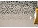 Close up of a marble mosaic wall with gold lighting at 151 Brailsford St, Charleston, SC 29492