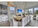 Spacious dining room with fireplace, television, and view of the grounds at 151 Brailsford St, Charleston, SC 29492
