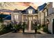 An elegant home with manicured landscaping and a grand entrance sets a welcoming tone at 151 Brailsford St, Charleston, SC 29492
