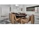 Spacious game room with a poker table and comfortable wicker chairs for a great playing experience at 151 Brailsford St, Charleston, SC 29492
