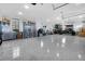 Spacious garage with epoxy floors, storage cabinets, and a well-organized interior layout at 151 Brailsford St, Charleston, SC 29492
