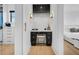 Chic hallway includes vanity, modern lighting, and decor at 151 Brailsford St, Charleston, SC 29492