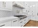 Stylish kitchen with stainless steel appliances, and white cabinetry and counters at 151 Brailsford St, Charleston, SC 29492