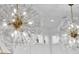 Stunning, ornate chandeliers illuminate a luxurious kitchen at 151 Brailsford St, Charleston, SC 29492