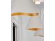 Modern lighting fixture showcases a sleek design with a gold leaf interior at 151 Brailsford St, Charleston, SC 29492