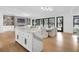 Open-concept kitchen flows into living and dining areas, perfect for entertaining at 151 Brailsford St, Charleston, SC 29492