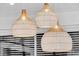 Close up on the three decorative pendant lights in the dining room at 151 Brailsford St, Charleston, SC 29492