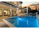 Backyard pool area featuring an outdoor patio with luxurious seating and scenic views at 151 Brailsford St, Charleston, SC 29492