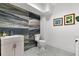 Stylish powder room with designer tile, modern vanity, and elegant fixtures at 151 Brailsford St, Charleston, SC 29492