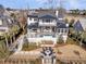 Back of house shows pool and elevated patio overlooking the golf course at 151 Brailsford St, Charleston, SC 29492