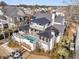 Charming rear exterior featuring an outdoor lounge area, pool, and balcony at 151 Brailsford St, Charleston, SC 29492