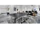 Spacious recreation room features a ping pong table and ample seating for entertainment at 151 Brailsford St, Charleston, SC 29492
